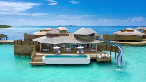 Overwater villa at sunset